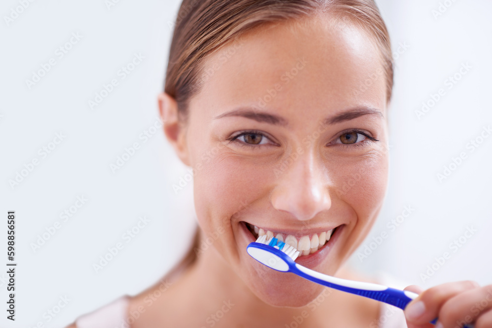 Woman, portrait and brushing teeth in bathroom with smile, health and self care for oral hygiene, wellness and routine. Girl, toothbrush and happiness for cleaning, healthy mouth and start morning Woman, portrait and brushing teeth in bathroom with smile, health and self care for oral hygiene, wellness and routine. Girl, toothbrush and happiness for cleaning, healthy mouth and start morning