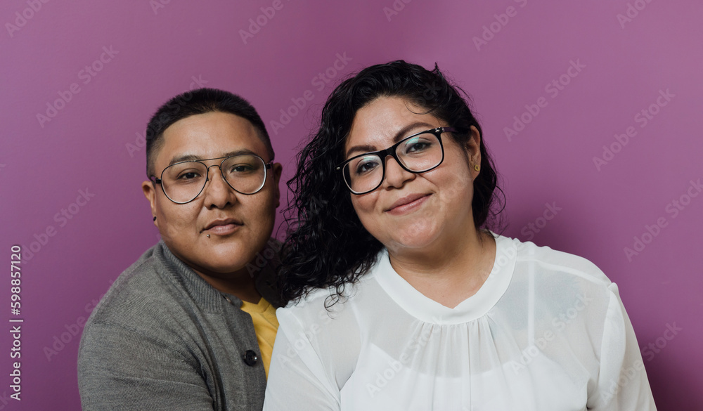 Latin lesbian couple portrait in Mexico, Hispanic homosexual people from lgbt community in Latin America Latin lesbian couple portrait in Mexico, Hispanic homosexual people from lgbt community in Latin America