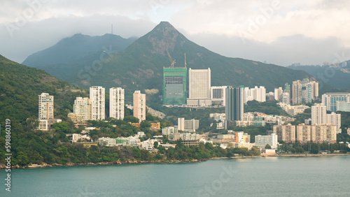 Canvas Print View of Hong Kong Island living and business quarter cityscape with many skyscraper buildings from sea