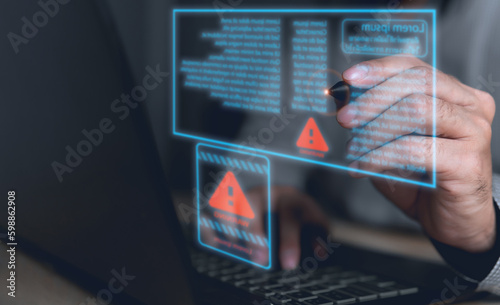 Computer hack warning,System hacked warning alert on notebook (Laptop),cyber security concept,The danger of malware viruses,ransomware virus,triangle caution warning sign notification error..