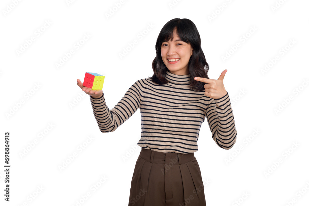 Asian woman holding a puzzle cube standing on white background. solving cubic problems, problem solution and making strategic moves concept