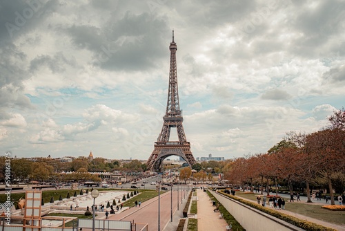 big eiffel tower and cloudy sky