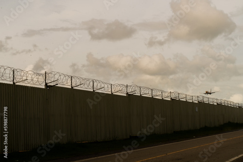 Background of prison warfare, barbed wire fence in Phuket Thailand