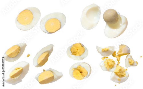 Set of hard boiled egg cut in halves and chopped isolated on white background 