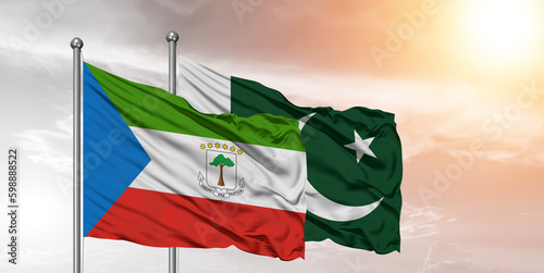 Flags of Pakistan and Equatorial Guinea friendship flag waving on the sky with beautiful Background.