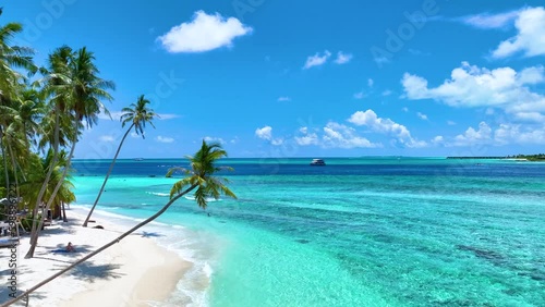 The summer tropical on the sandy beach and turquoise Tropical beach with blue sky background