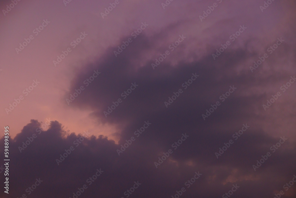 dark cloud and purple sky in the evening.