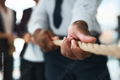 Its about to get competitive. unrecognizable businesspeople pulling on a rope. © Nicholas Felix/peopleimages.com