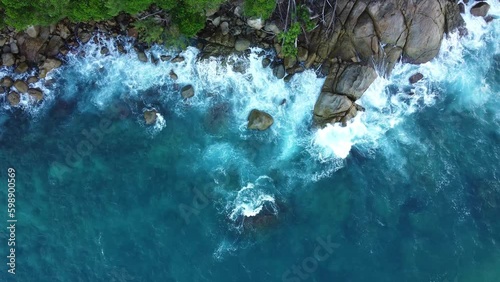 beautiful waves crashing in the ocean of Seychelles photo