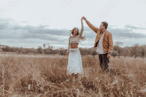 happy couple in the park on a beautiful sunny day
