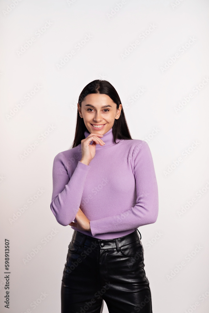 Portrait of a beautiful smiling young girl in casual clothes standing isolated over gray background Portrait of a beautiful smiling young girl in casual clothes standing isolated over gray background