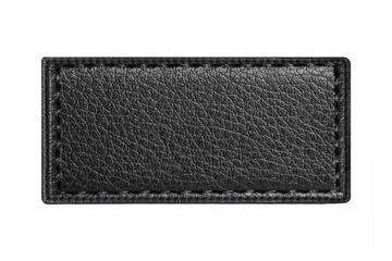 Black leather belt strap closeup isolated on white. Black stitched leather seam frame label tag isolated on white. Empty copy space fashion background. Textile frame cutout.