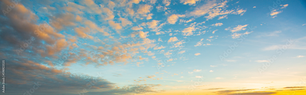 clouds and orange sky,Real amazing panoramic sunrise or sunset sky with gentle colorful clouds. Long panorama, crop it clouds and orange sky,Real amazing panoramic sunrise or sunset sky with gentle colorful clouds. Long panorama, crop it