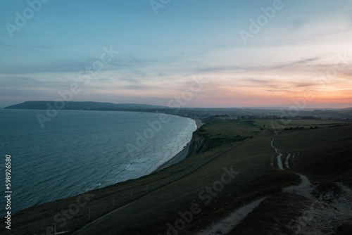 Sunset view of the sea from a clifftop