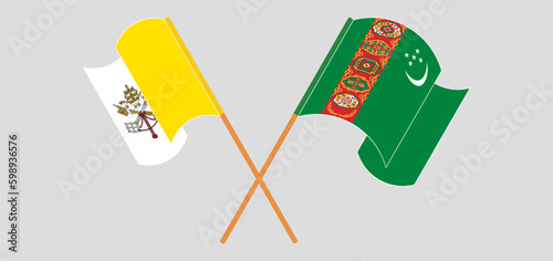 Crossed and waving flags of Vatican and Turkmenistan