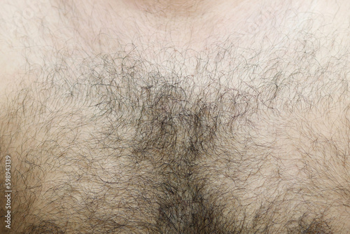 Schilderij op canvas A man with black chest hair