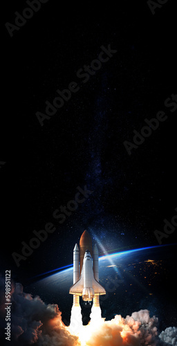Space Shuttle takes off into space. Elements of this image furnished by NASA.