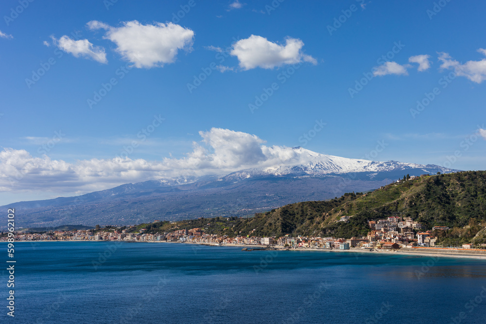 Panoramic view on Giardini on Sicily with Mount Etna on beautiful sunny day