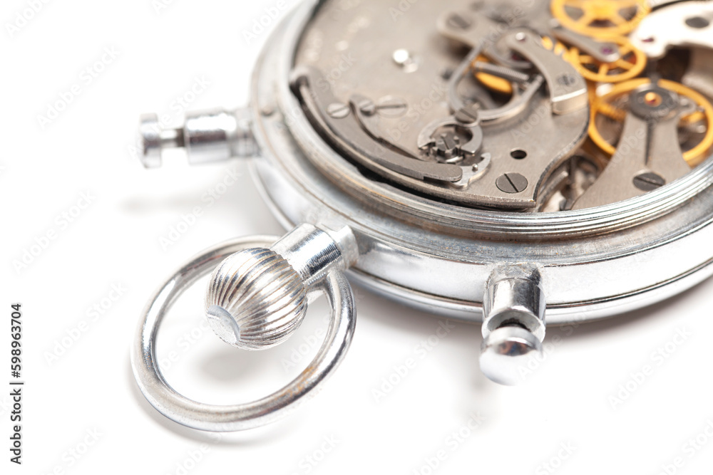Mechanism, clockwork of a stopwatch close-up. Time, work concept Mechanism, clockwork of a stopwatch close-up. Time, work concept
