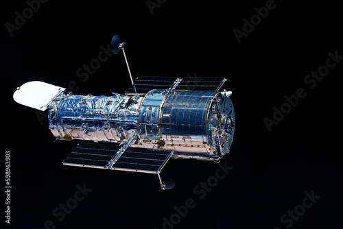 Fototapeta Naklejka Na Ścianę i Meble -  A space telescope in outer space. Elements of this image furnished NASA.
