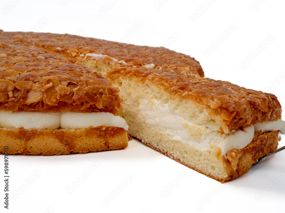 Bee sting cake, light cake with cream filling, with crispy almonds. Bee sting cake, light cake with cream filling, with crispy almonds.