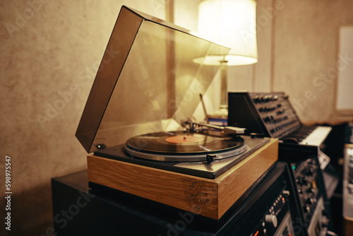 Record player on a table in a recording studio photo