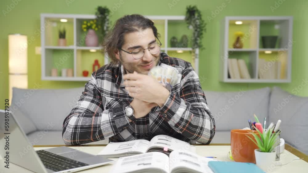 Funny and funny young man kisses and loves their money. Funny and funny young man kisses and loves their money.
