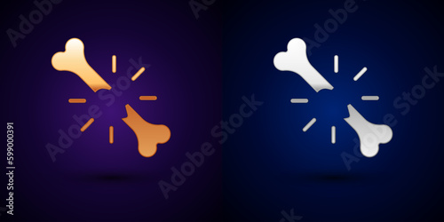 Gold and silver Human broken bone icon isolated on black background. Vector