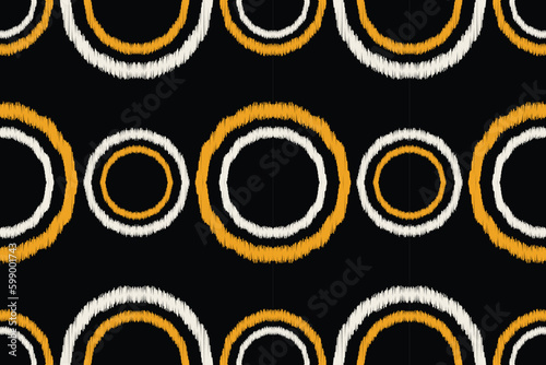 Ethnic Ikat fabric pattern geometric style.African Ikat embroidery Ethnic oriental pattern black background. Abstract,vector,illustration.For texture,clothing,scraf,decoration,carpet.