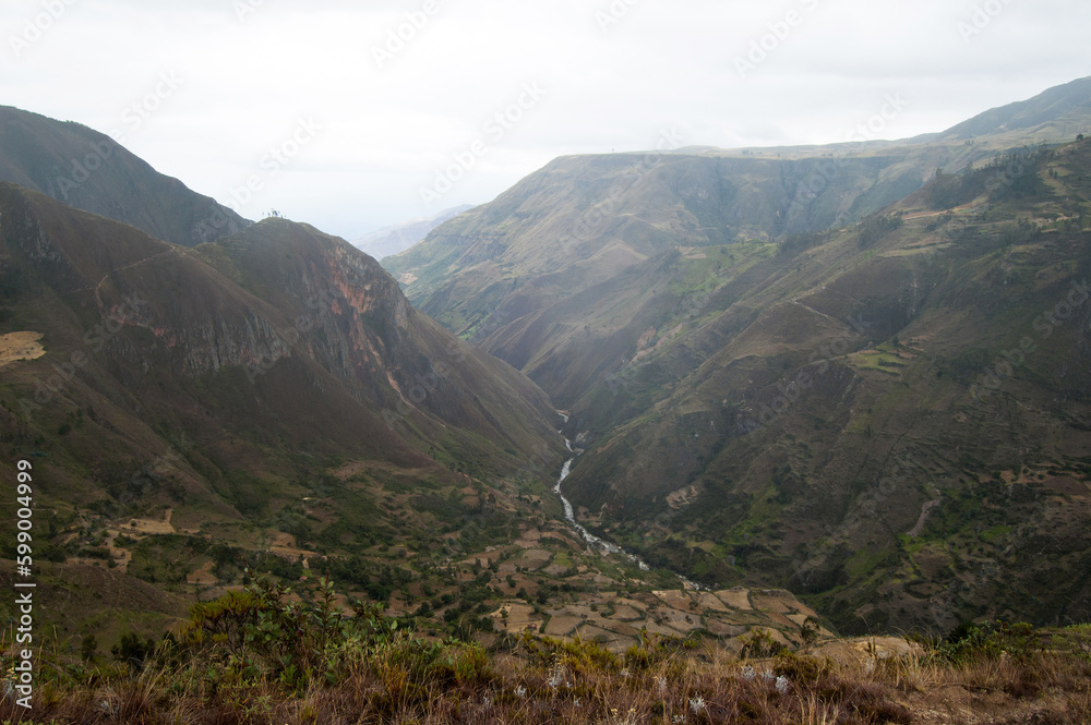 Beautiful aerial view of a green valley with river. Saraguro, Ecuador