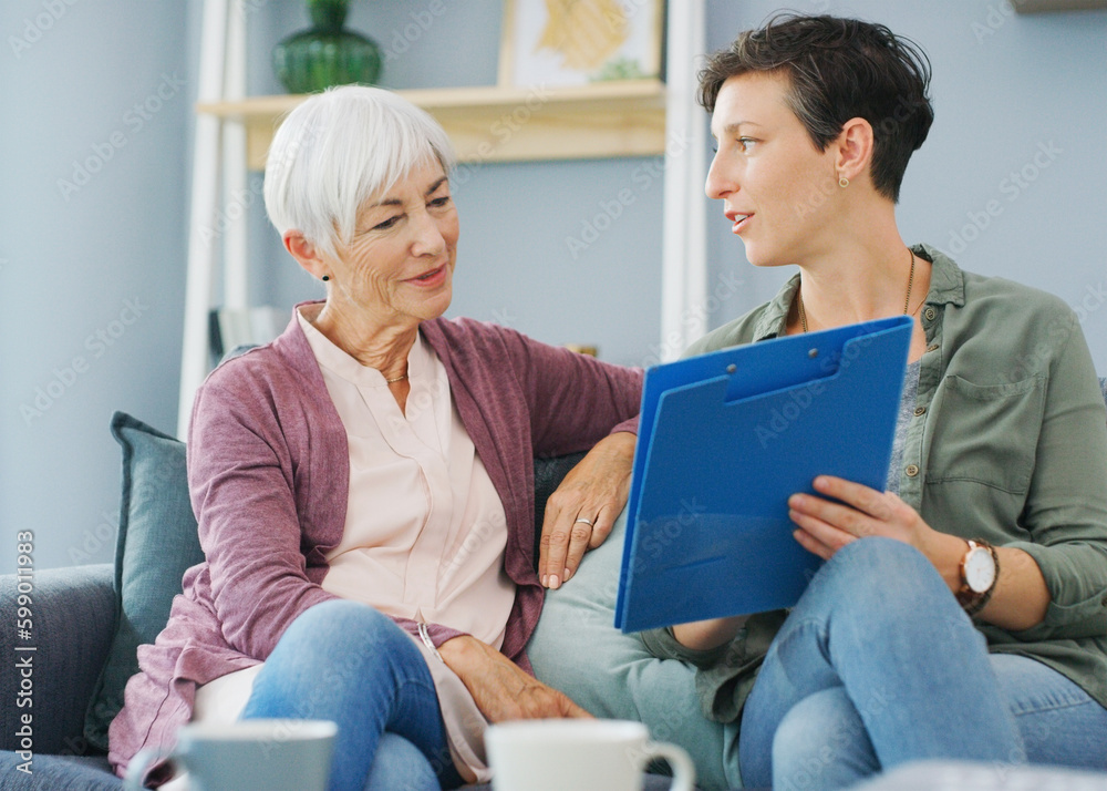 Look at your results. an attractive young healthcare professional sitting with her senior patient and discussing her medical results. Look at your results. an attractive young healthcare professional sitting with her senior patient and discussing her medical results.