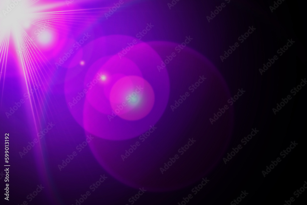 abstract background with glowing circles lens flare light on black background