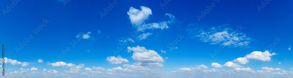 Blue Sky background with tiny Clouds. Panorama background