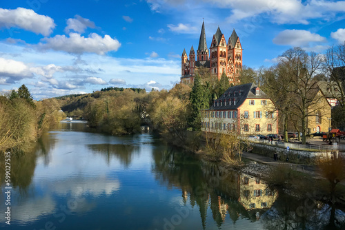 Scenic view of Limburg Cathedral, Germany and river Lahn against blue sky with clouds