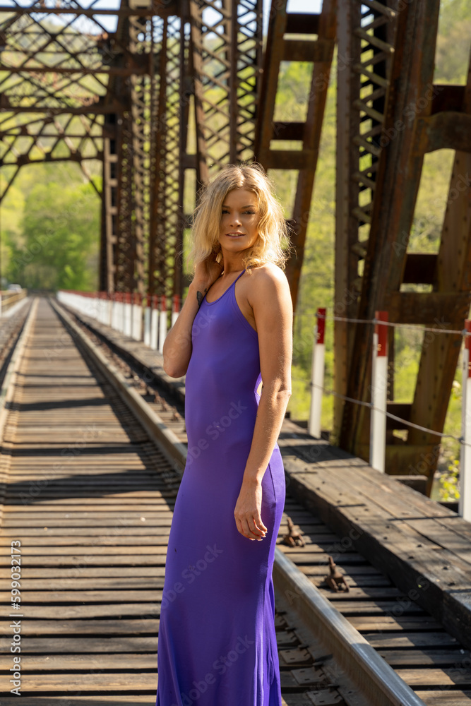 Model in purple dress
