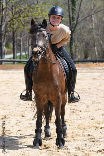 Reiterin mit Pferd