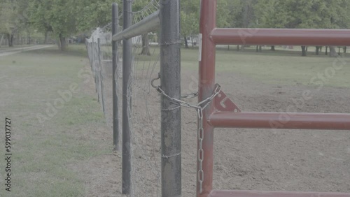 Chained gate on a farm / Sony SLog3