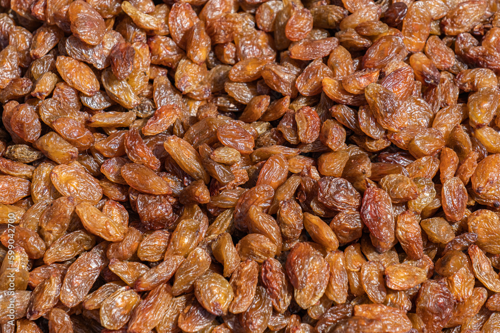 Raisin texture, full frame photo background. Dried Grapes.