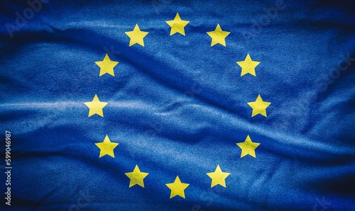 Concept of the fabric flag of the European Union. Flag of European Union painted on cotton fabric. © shadowmoon30