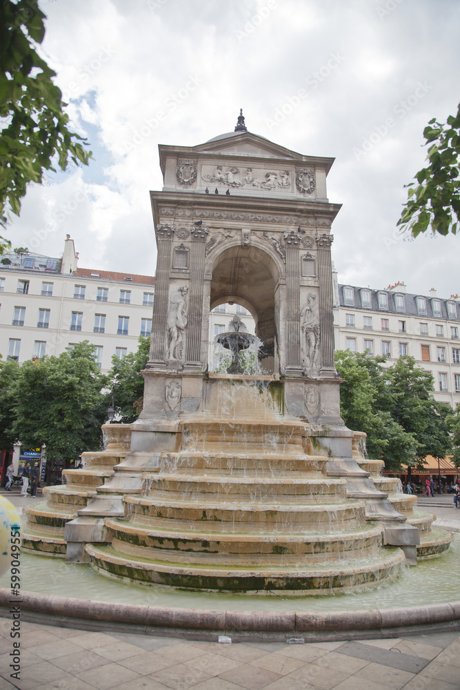 Ancient fountain in Paris, France.