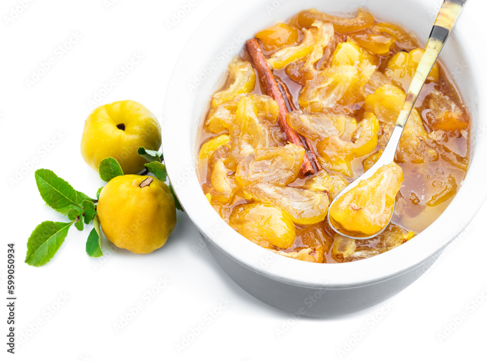 Homemade quince jam in ceramic bowl and fresh quince with leaves isolated on white Homemade quince jam in ceramic bowl and fresh quince with leaves isolated on white