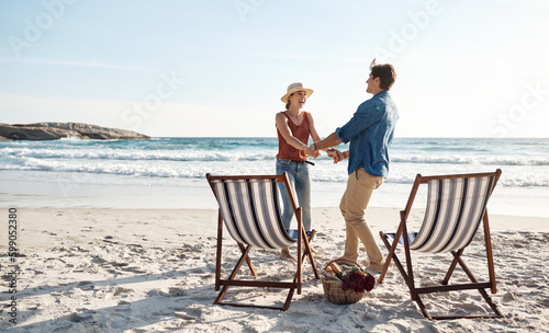 Were exactly where were supposed to be. a middle aged couple dancing on the beach.
