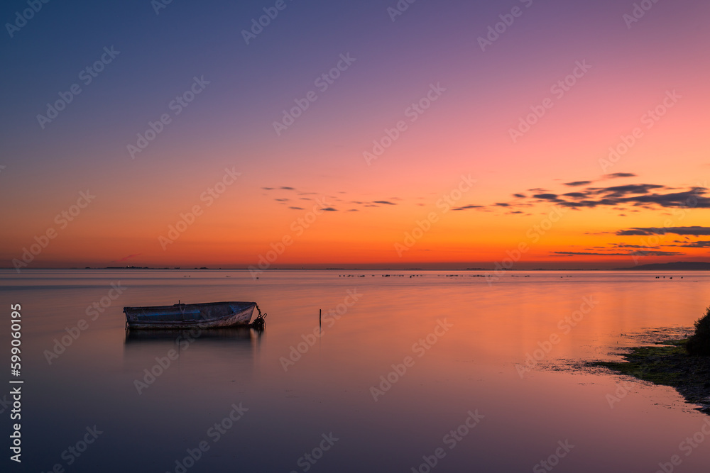 sunset on the lake in the Delta del Ebro, in Catalonia, Spain