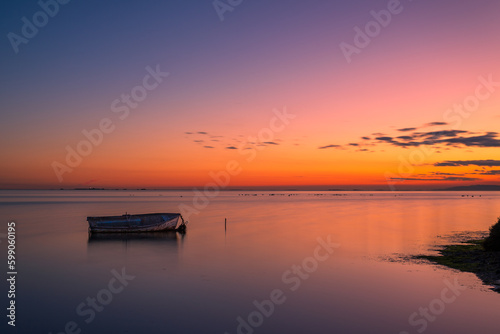 sunset on the lake in the Delta del Ebro, in Catalonia, Spain