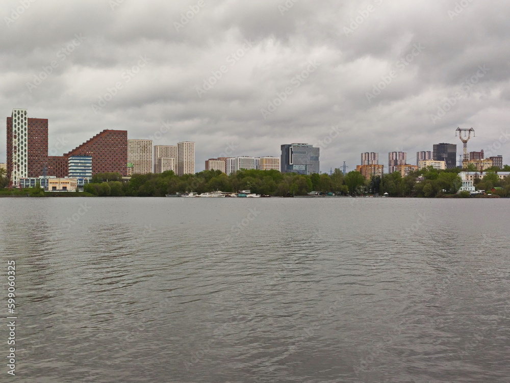 Naklejka premium May rain over the metropolis