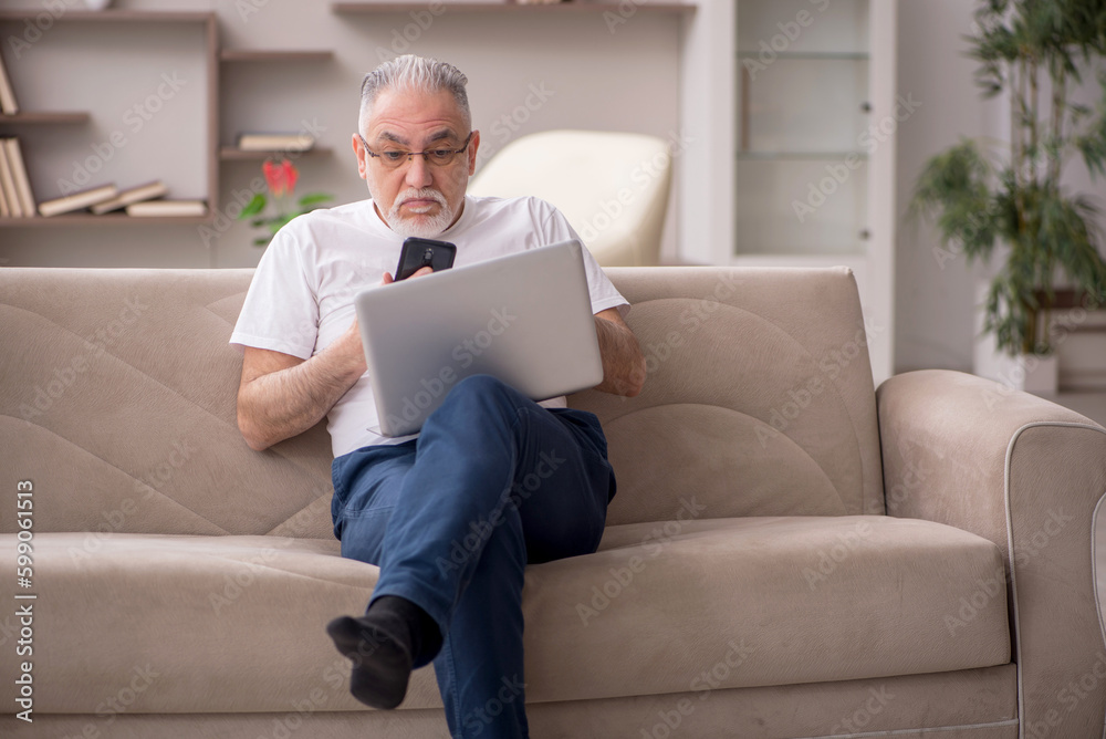 Old man sitting at home Old man sitting at home