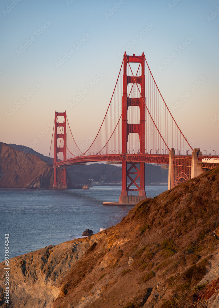 Golden Gate Bridge and Fort Point Rock at Sunset Golden Gate Bridge and Fort Point Rock at Sunset