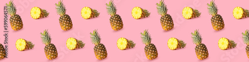 Many ripe pineapples on pink background. Pattern for design