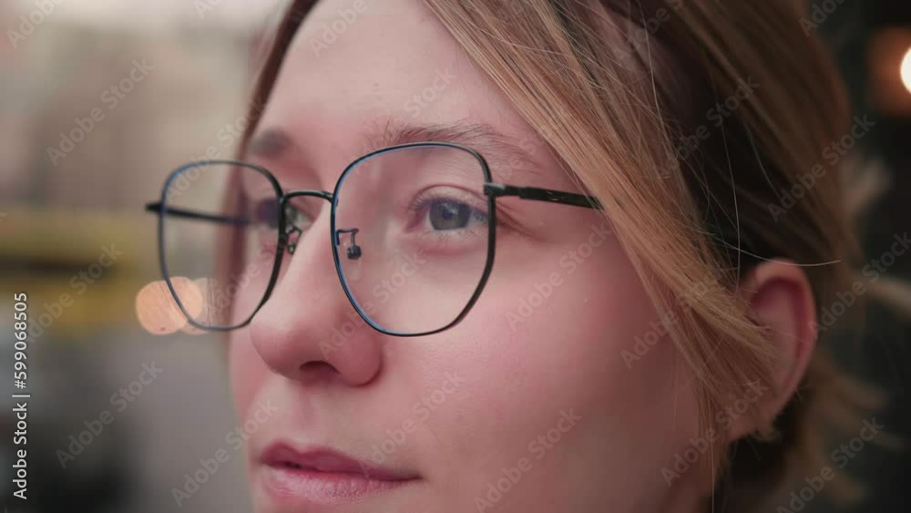 Dramatic Close up of beautiful caucasian woman with glasses smiling portrait slow motion soft natural ligh city Dramatic Close up of beautiful caucasian woman with glasses smiling portrait slow motion soft natural ligh city