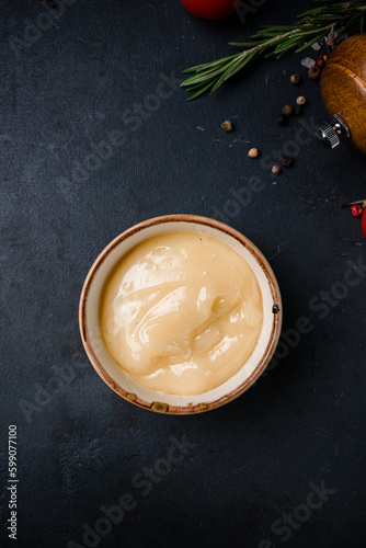 Garlic sauce in a small ceramic bowl.
